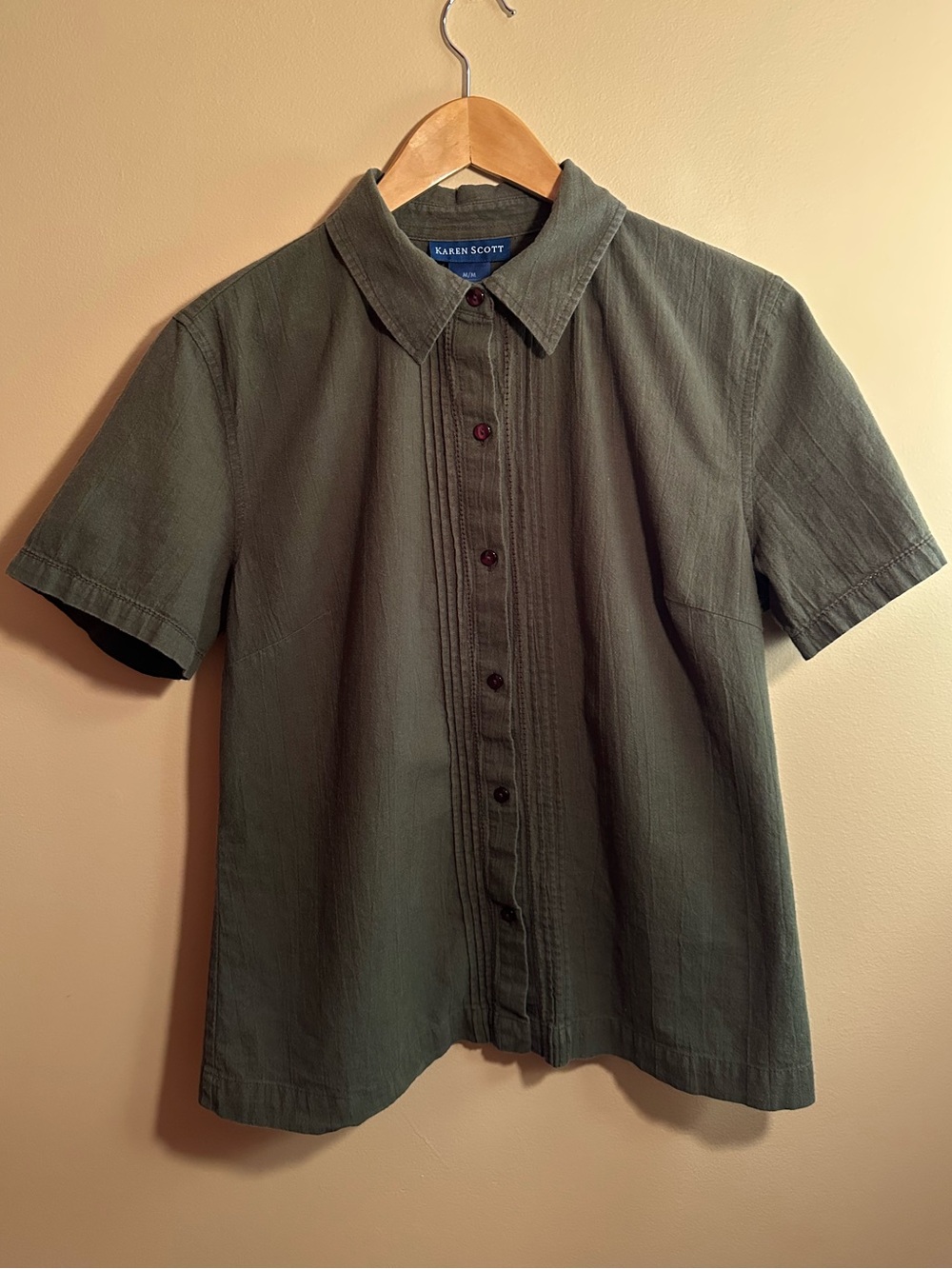 green short sleeved buttonup shirt